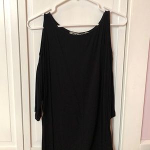 Michael stars cold shoulder black top.